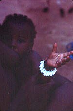 17. Sunu wearing cowry shell and Sunu bracelets