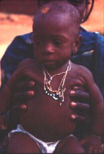 25. Baby Kouakou wearing jewelry