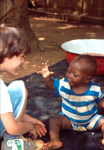 4. Nathaniel playing with baby Sassandra